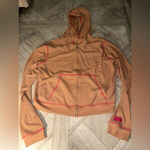 Fabletics Zip-Up Waffle Hoodie in the Teddy/Fuchsia color.